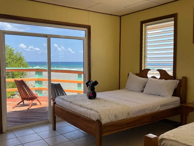 Bedroom sea view balcony — Isla Marisol Resort, Belize