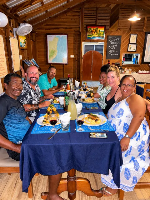 Guests sharing a meal in the island restaurant