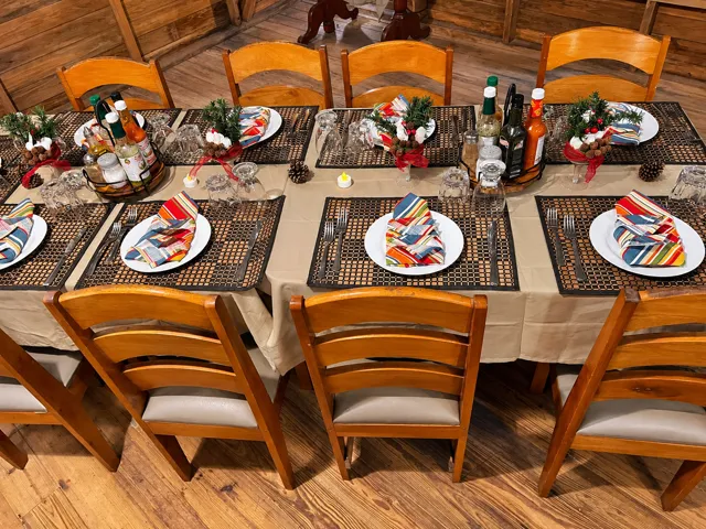 Shared dinner table set for an island meal